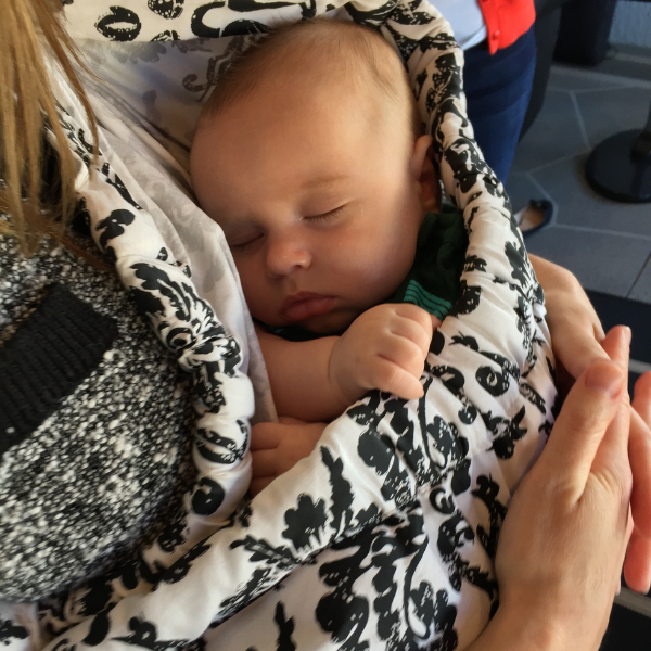 baby sleeping in carrier