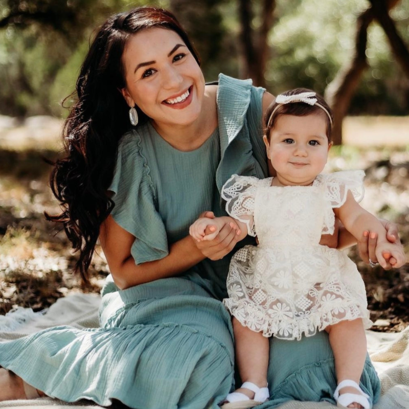 Mom wearing a 100% cotton nursing dress for family photos