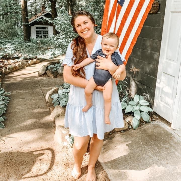 Mom wearing cotton nursing dress to breastfeed in the summer heat