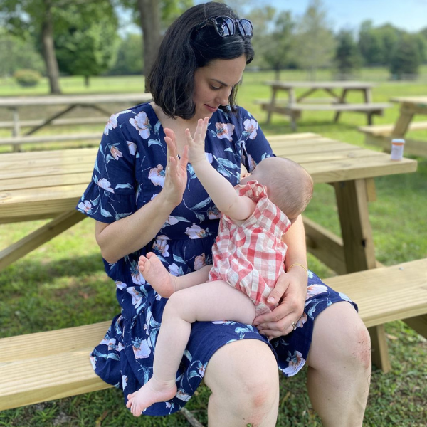 mom breastfeeding in nursing dress