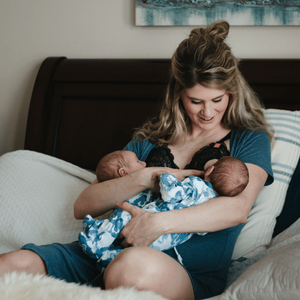 Mom nursing her twins