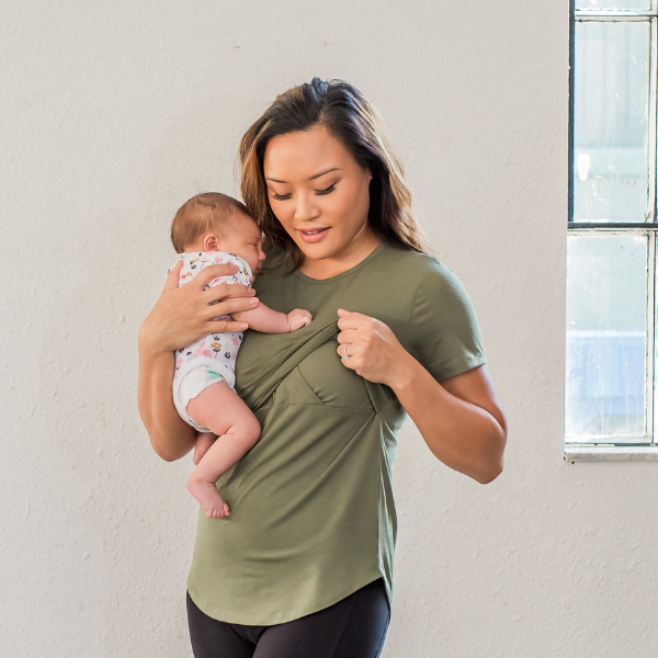 Mom wearing nursing shirt with baby