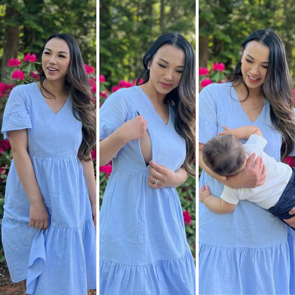 Mom nursing in blue dress designed for breastfeeding