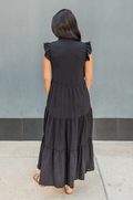 Mom wearing a black nursing dress showing the back of the dress