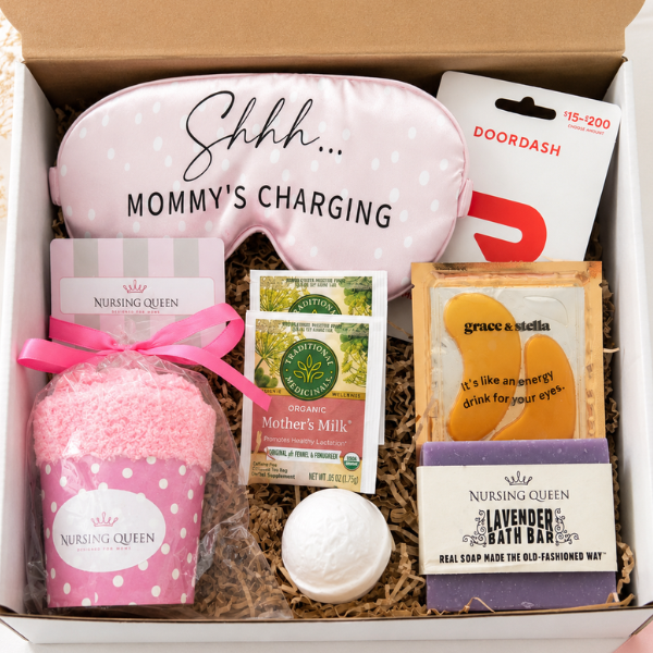 New mom gift box for breastfeeding mom complete with Nursing Queen gift card, Door Dash gift card, soap, sleep mask, novelty socks, eye masks and Mother's Milk tea. 