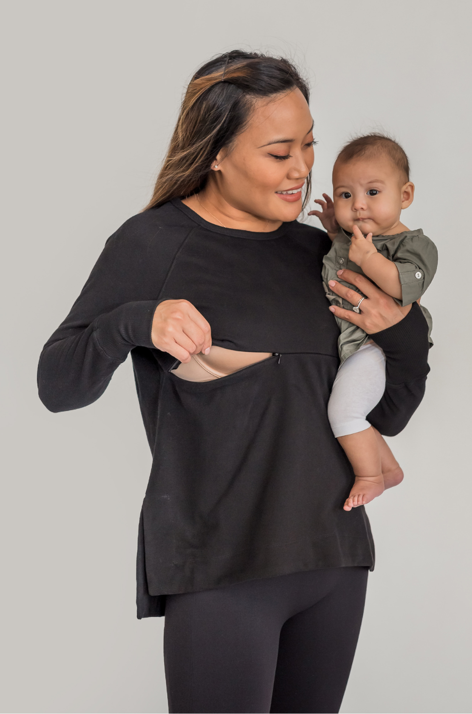 Mom and baby with a black nursing yoga tunic