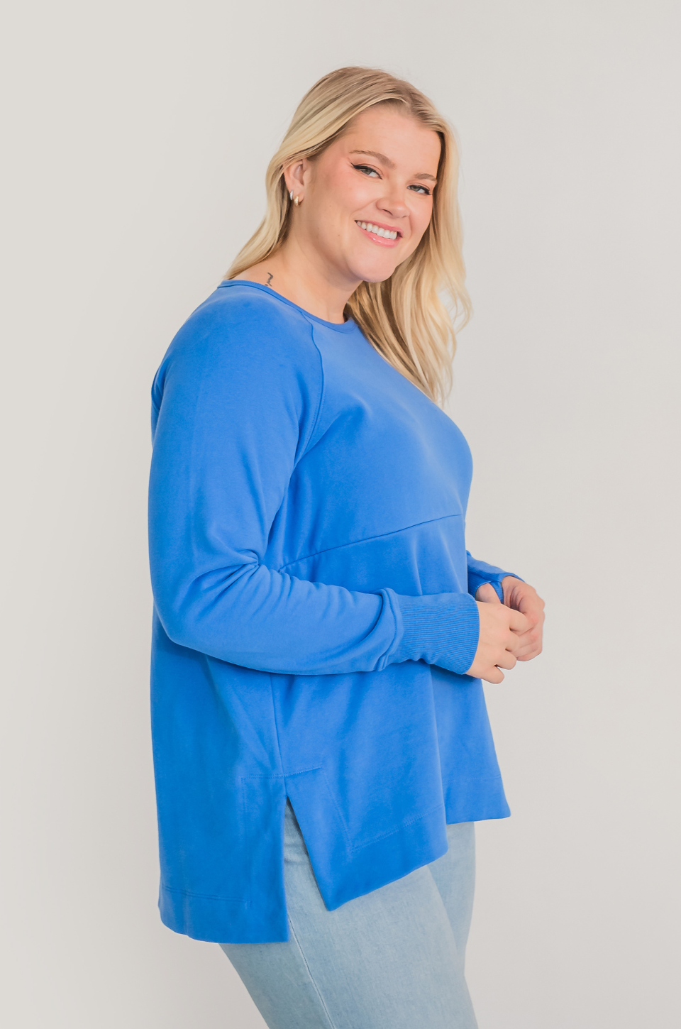 Blue nursing tunic with hidden pumping access