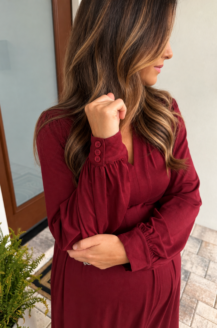 Close up of button details on a nursing and maternity dress for fall and winter