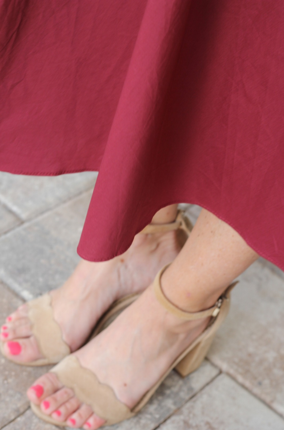 Close up of fabric on cotton nursing dress hem line