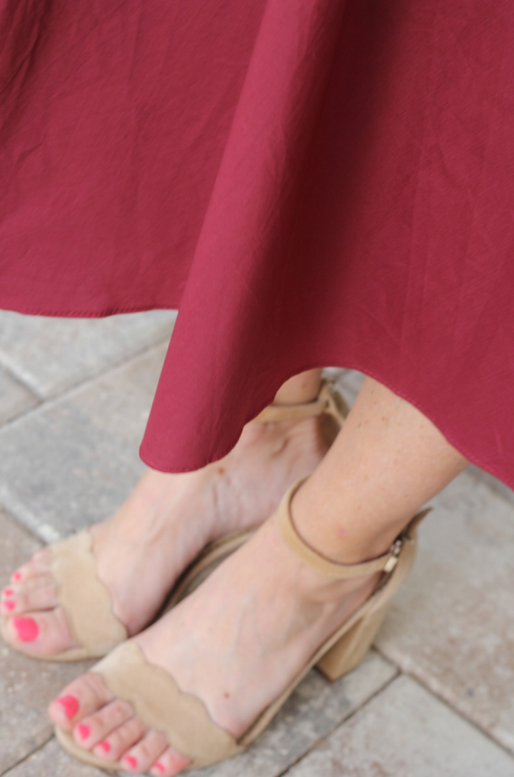 Close up of fabric on cotton nursing dress hem line