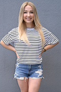 Mom wearing a black and white striped nursing t-shirt featuring discreet hidden zipper access for breastfeeding, relaxed fit postpartum top for daily wear.