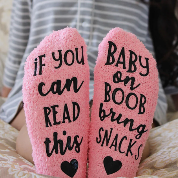 Gift basket for breastfeeding mom includes novelty socks for nursing and pumping moms.