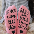 Gift basket for breastfeeding mom includes novelty socks for nursing and pumping moms.