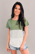 A mom wears the Nursing Queen green 3-block colorblock breastfeeding t-shirt with a relaxed, everyday fit perfect for casual wear.