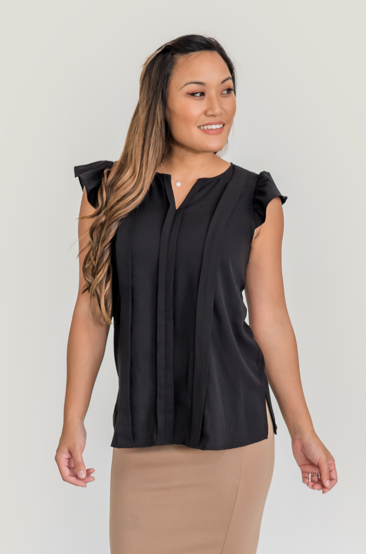 Front view of black maternity and breastfeeding blouse with dressy silhouette and concealed zipper breastfeeding access.