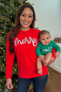 Mom wearing Merry shirt with matching baby onesie that says Bright
