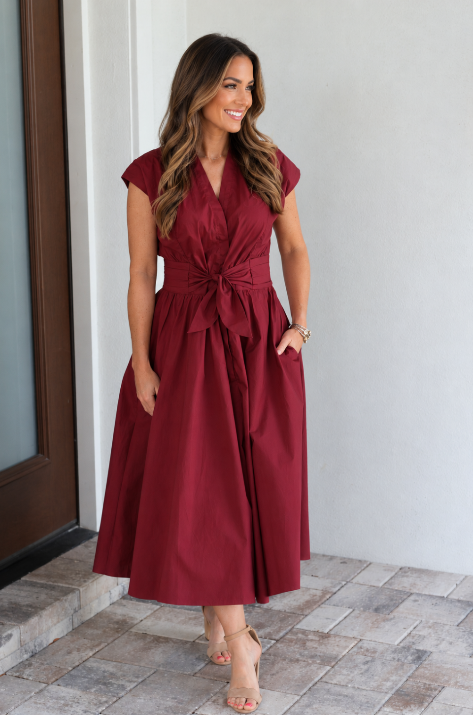 Mom wearing a dark red-colored breastfeeding cotton dress with hidden access and pockets