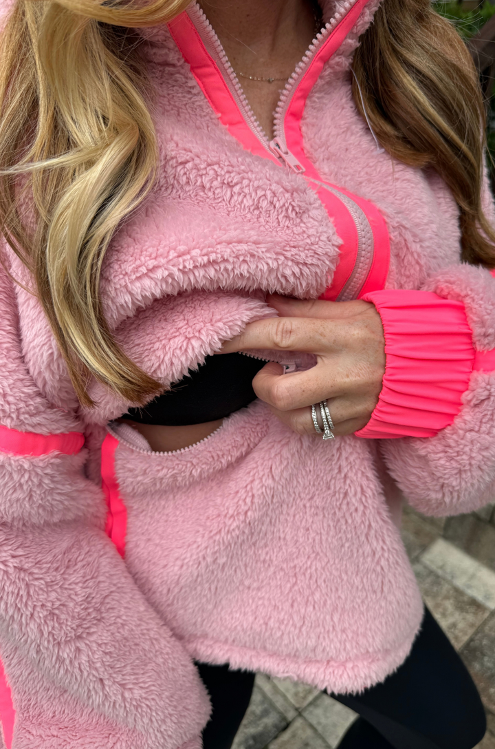 Close up of the breastfeeding access built into this nursing fleece jacket.