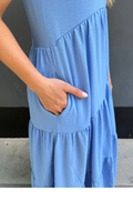 Close up of pockets on blue nursing dress for spring and summer 