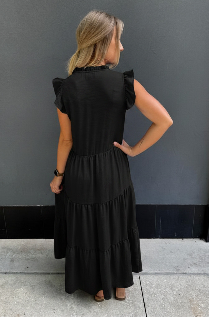 Black nursing dress with hidden zipper access for breastfeeding and pockets