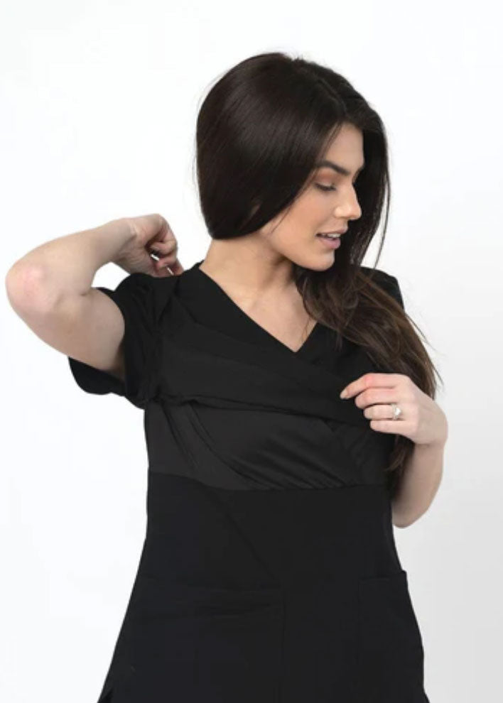 model wearing a black scrub for breastfeeding