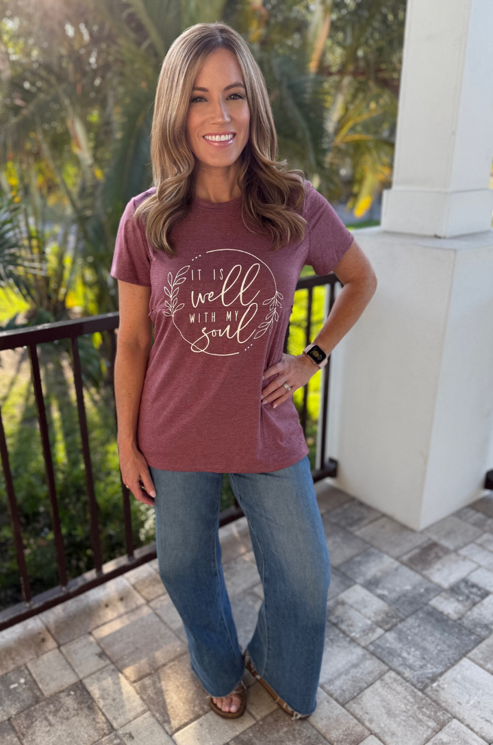 Hidden nursing access closed on heather plum breastfeeding T-shirt with seamless front appearance.