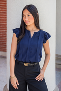 woman wearing a nursing work blouse with hidden zippers for breastfeeding