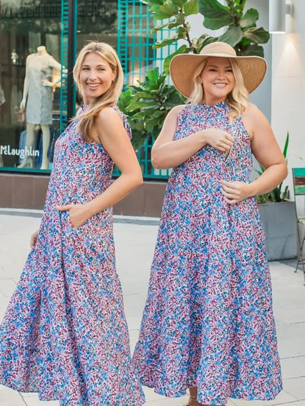 two models wearing floral print breastfeeding dresses