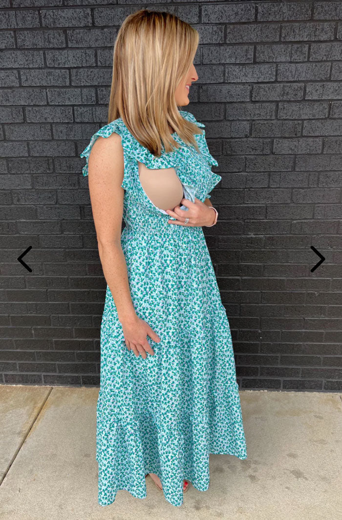 model showing the functioning of the hidden zipper access on the side of the dress