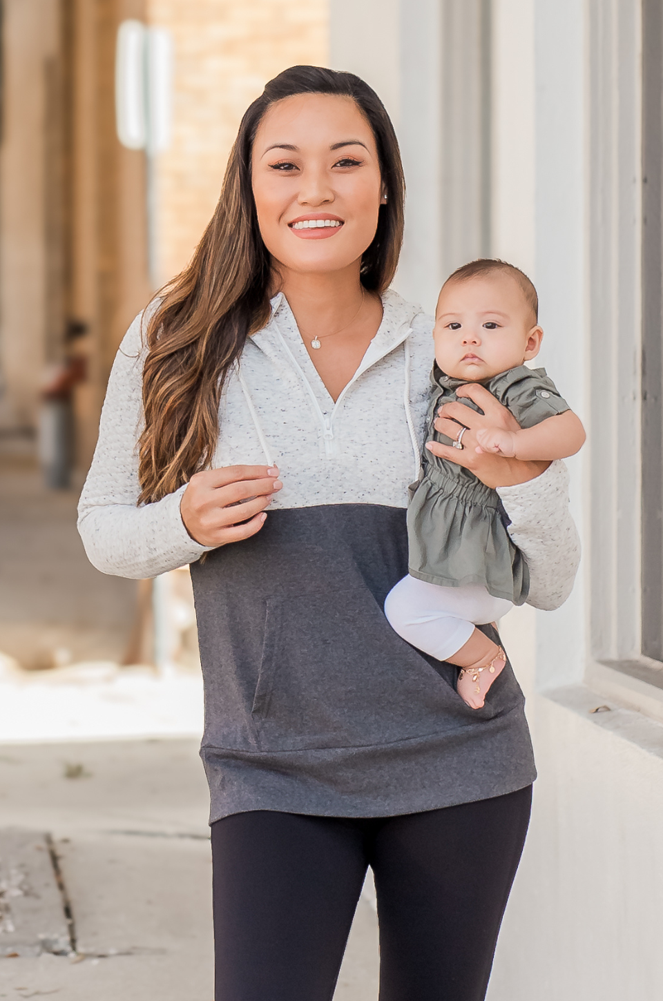 mom wearing oatmeal waffle hoodie