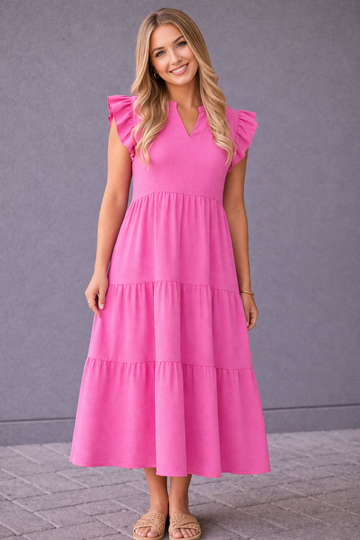 woman wearing pink nursing dress with zippers
