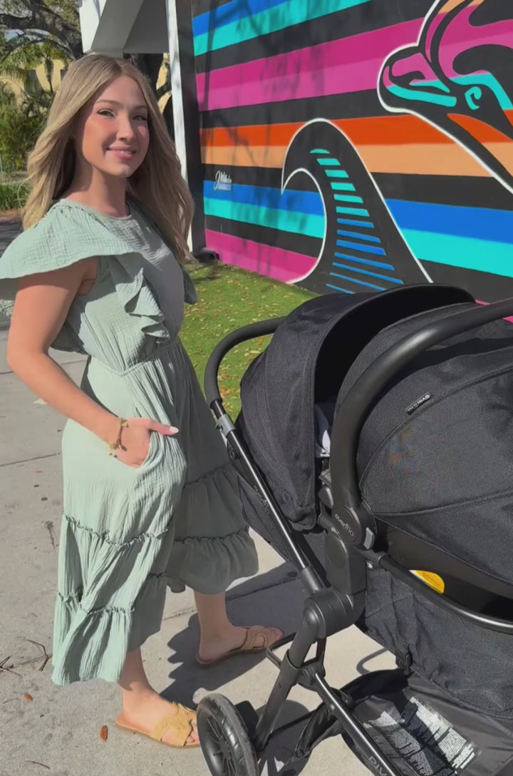 In this video a woman shows how the hidden nursing access works for breastfeeding in this 100% cotton nursing and pumping dress. 