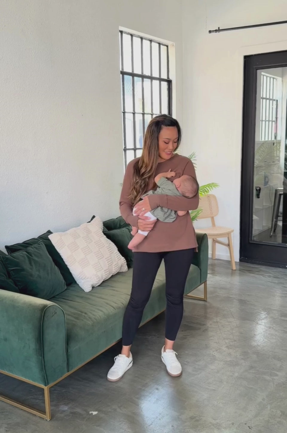 Mom wearing breastfeeding yoga tunic