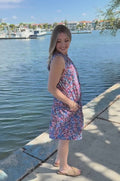 In this video a mom shows how the hidden nursing access works in this breastfeeding dress. 