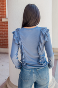 Back view of vintage blue ribbed breastfeeding top with ruffle accents.