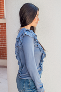 Side view of ruffled shoulder detail on vintage blue ribbed breastfeeding top, covering the hidden zipper opening.