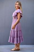 Side view of lavender gauze midi nursing dress with flowy silhouette suitable for postpartum wear.