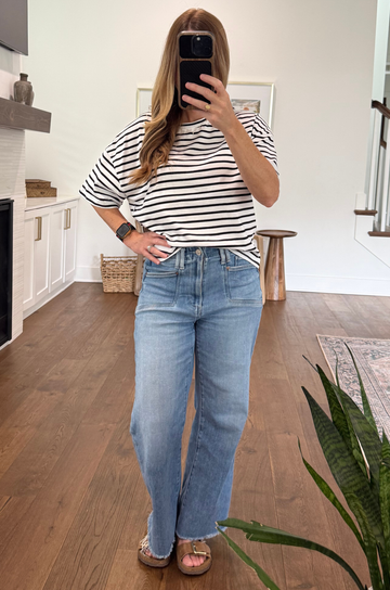 women wearing a breastfeeding friendly striped boxy tee for nursing and pumping hidden zipper access