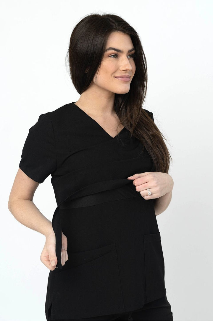 Close-up of nursing access detail on breastfeeding scrub top.